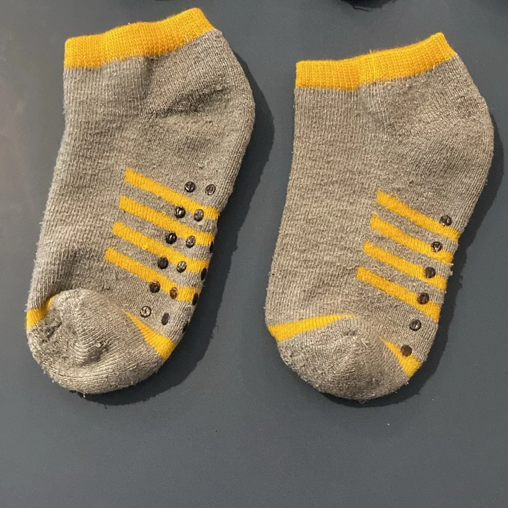 Toddler Boys socks with feet. EUC. Blue,red, yellow, black. 4 pairs